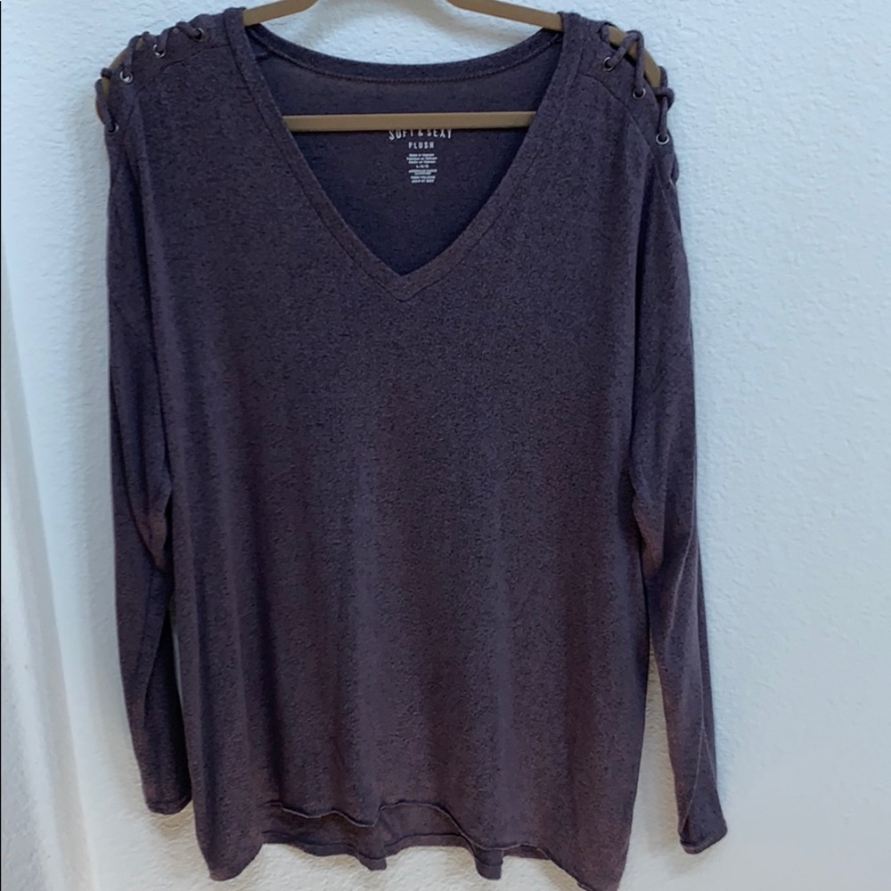 V-neck purple sweater with lace up shoulder detail
